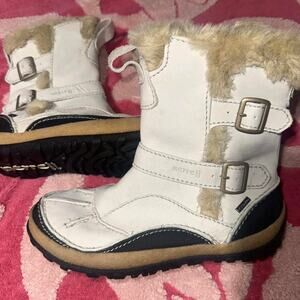 White and brown merrell boots